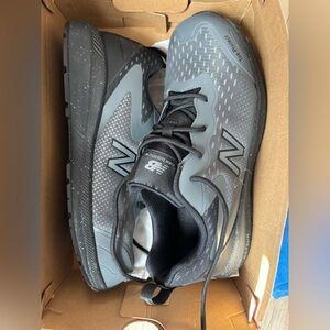 New Balance Men's Black and Gray steel toe shoe